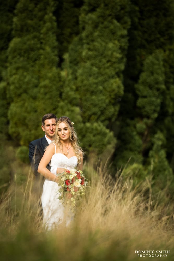 Couple photo taken in the meadow at Nymans