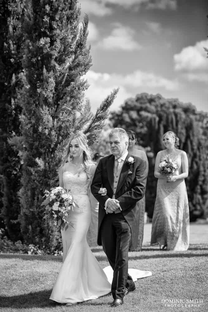 Bridal party walking to the ceremony