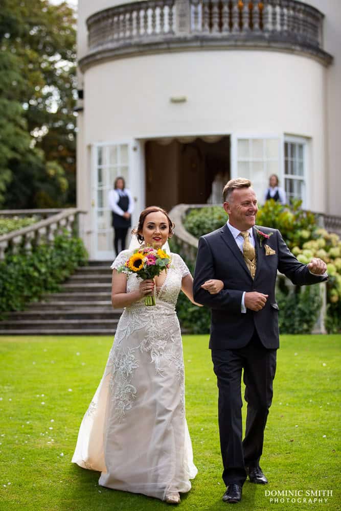 Walking down the aisle at Little Hermitage