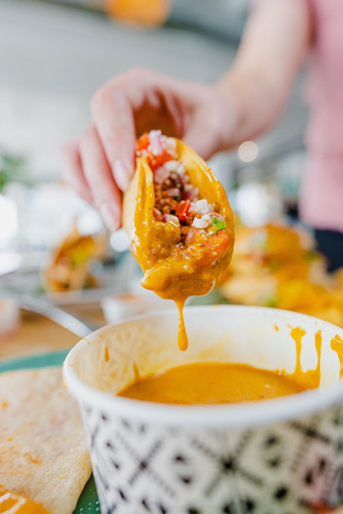taco dipped in sauce