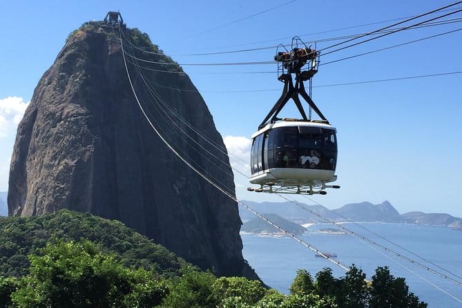 Cable car ascending Sugarloaf Mountain, a popular place in Brazil.