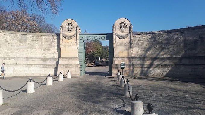 Old stone wall entrance to Le Marais, a must-visit Paris spot