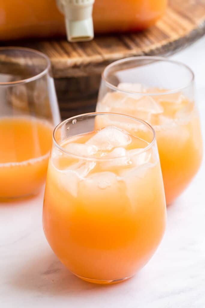 https://sp-ao.shortpixel.ai/client/to_webp,q_lossy,ret_img,w_683,h_1024/https://partyfoodfavorites.com/wp-content/uploads/2022/12/easy-party-punch-recipe-16-683x1024.jpg