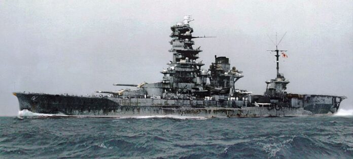 Japanese hybrid battleship and aircraft carrier Hyūga during sea trials after 1943 conversion with flight deck and catapults.