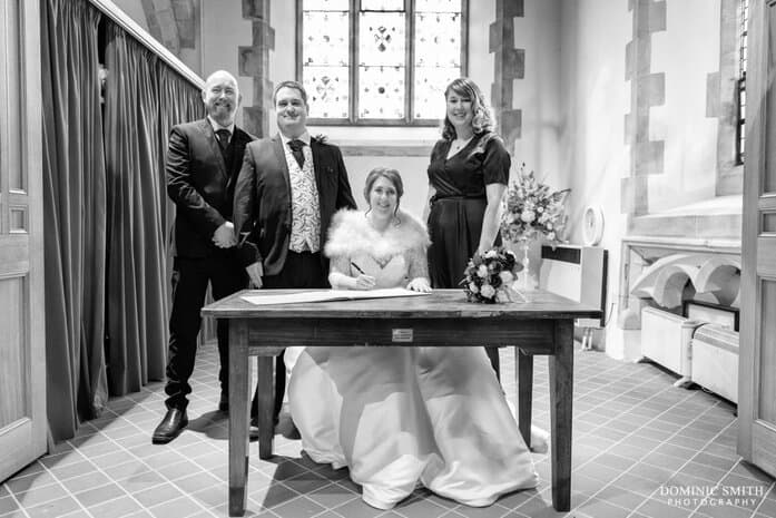 Signing the Register at St Michaels Church, Betchworth