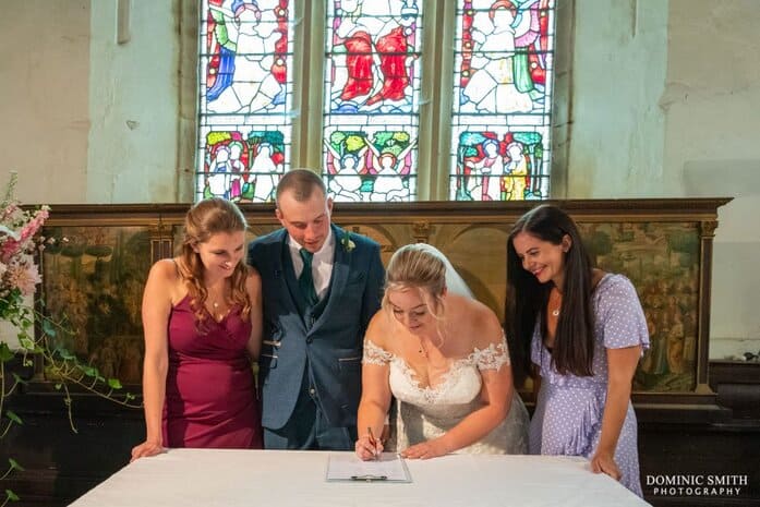 Signing The Register at St. Thomas A Becket Church, Robertsbridge