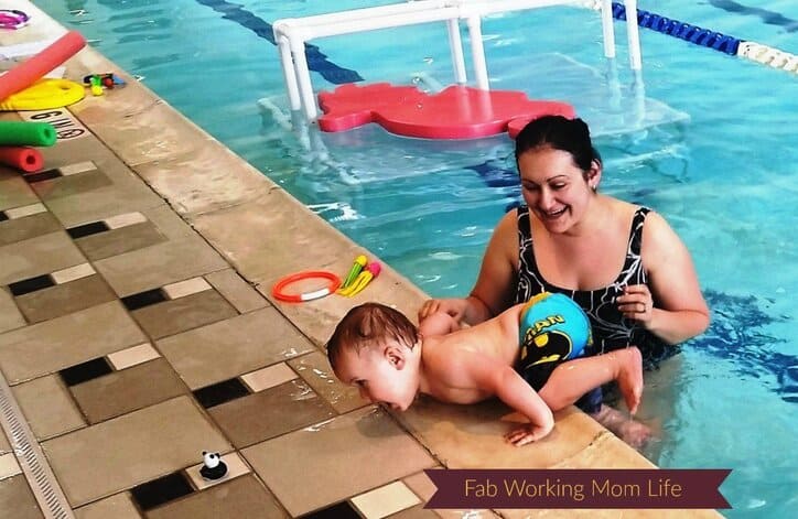 Baby H climbing out of the pool.