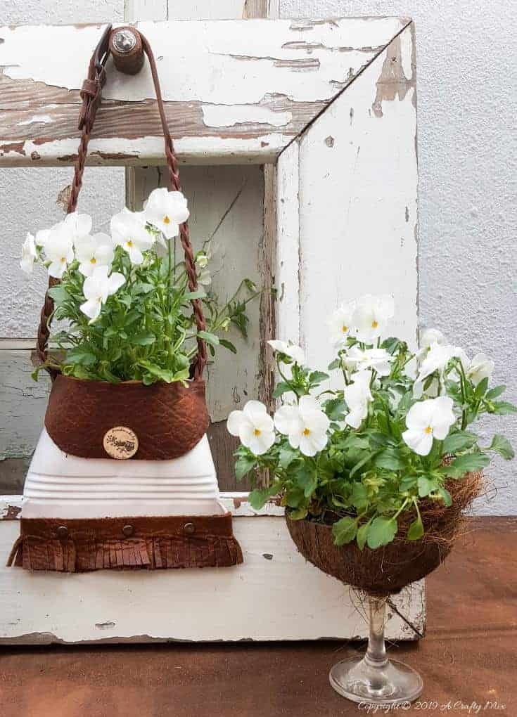 A beautiful recycled tin can handbag and coconut wine glass planters. Tutorials for both can be found on A Crafty Mix #tincan #recycle #repurpose #tincanrecycle #tincanplanter #acraftymix #creativetincanprojects #uniquetincanDIY