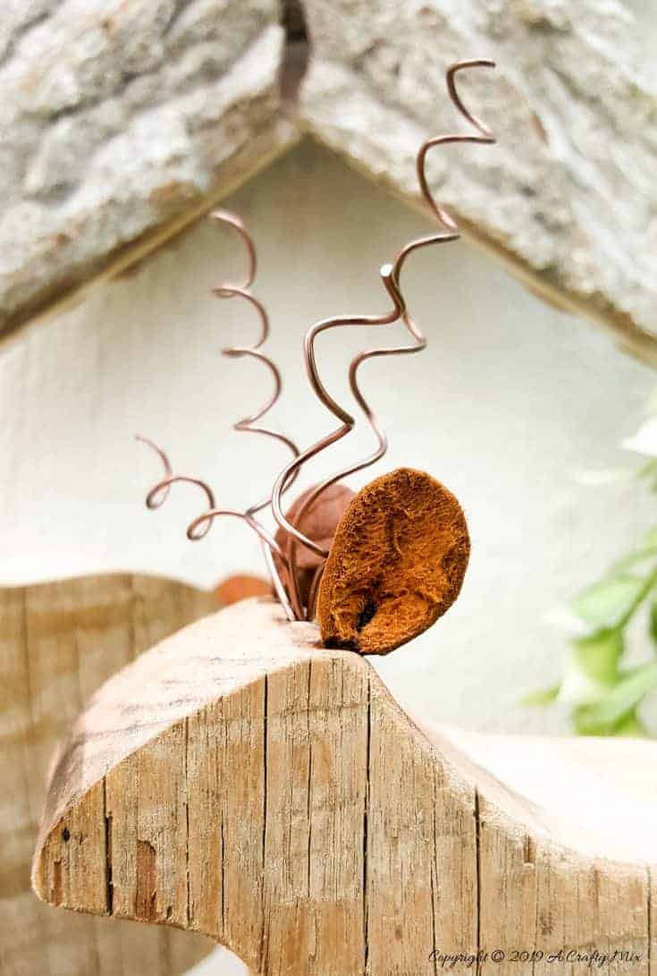 The reindeer horns are made by twisting wire around a pencil #woodenreindeer #DIYReindeer #DIYRustyReindeer #RustyNailrepurpose #acraftymix # Reindeerdecor #reindeertemplate