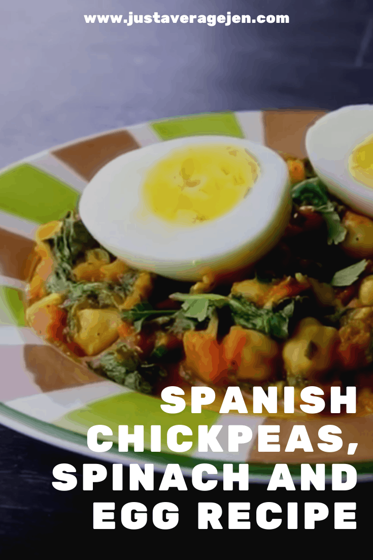 Pinterest pin of closeup of Spanish chickpeas on multi coloured plate