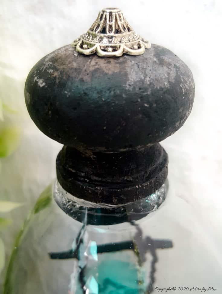 Use the 2 ingredient mold to make a custom fitted knob for the cloche #FairyGarden #FairyGardenIdeas #ACraftyMix #FairyGardenDIY #FairyBeachDIY #FairyGardenDesigns #ClocheDecor #ClocheIdeas #WineGlassCloche #ClocheDIY #WineGlassRepurpose #UnicornSPiT