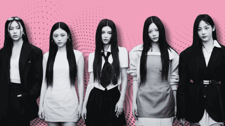 Stylish K-pop girl group members in black and white outfits with a vibrant pink pop art background, showcasing trending music culture and modern fashion.