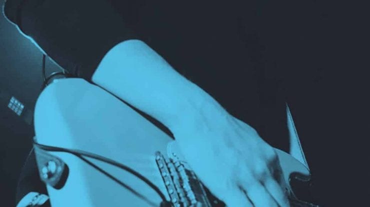 guitarist playing live in closeup