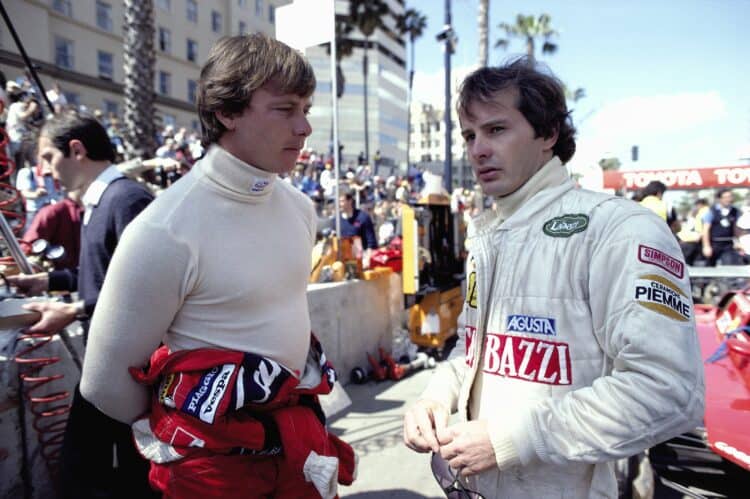 STREETS OF LONG BEACH, UNITED STATES OF AMERICA - APRIL 04: Didier Pironi and Gilles Villeneuve talk in the Ferrari pit during the United States GP West at Streets of Long Beach on April 04, 1982 in Streets of Long Beach, United States of America. (Photo by Rainer Schlegelmilch)