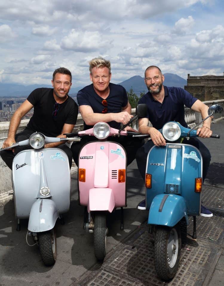EMBARGOED PICTURE: FOR PUBLICATION FROM TUESDAY 2ND OCTOBER 2018
From Studio Ramsay  GORDON, GINO AND FRED: ROADTRIP
Ep1 The Italian Job 
Wednesday 10th October 2018 on ITV  Pictured: Gino D'Acampo, Gordon Ramsay and Fred Sirieix in Naples in the shadow of Mount Vesuvius take to mopeds in search of the oldest pizzeria in town  Three big egos, one small van. Gordon, Gino and Fred pack up their camper van once again and head off on a European adventure, but this time itÕs personal as each episode takes us on a tour of their cherished homelands, each of them with a special occasion to prepare for. With three countries, three weeks and three coqs au vin in close confinement what could possibly go wrong?  In episode one, Gordon, Gino and Fred start their road trip in GinoÕs homeland of Italy, where Gino needs help to pull off an event that is close to his heart. His best friendÕs vow renewal ceremony is taking place in front of 50 guests, in just four daysÕ time.  © ITV  Photographer: Tony Ward  For further information please contact Peter Gray
0207 157 3046 peter.gray@itv.com  This photograph is © ITV and can only be reproduced for editorial purposes directly in connection with the  programme GORDON, GINO AND FRED: ROADTRIP or ITV. Once made available by the ITV Picture Desk, this photograph can be reproduced once only up until the Transmission date and no reproduction fee will be charged. Any subsequent usage may incur a fee. This photograph must not be syndicated to any other publication or website, or permanently archived, without the express written permission of ITV Picture Desk. Full Terms and conditions are available on the website www.itvpictures.com