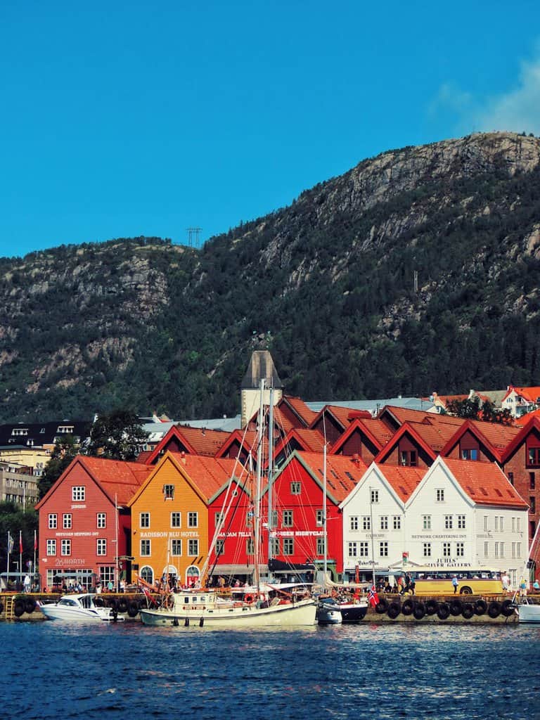 colorful bryggen houses and boats in bergen norway