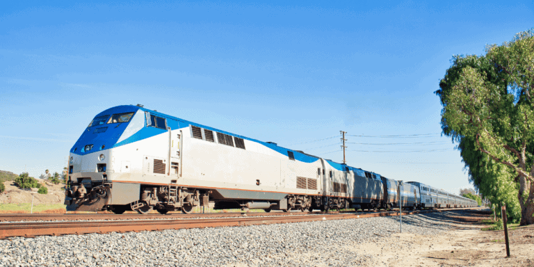 amtrak train against blue sky