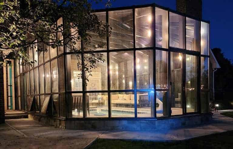 swim spa addition on home at night