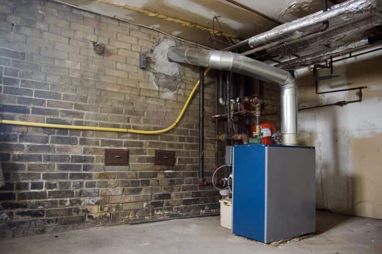 a photo of a furnace in the basement