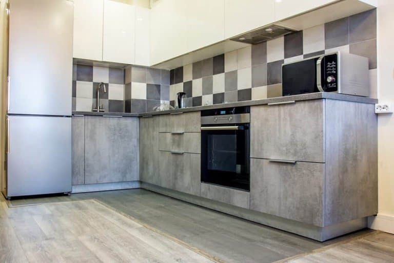 picture of grey kitchen cabinet toe kick