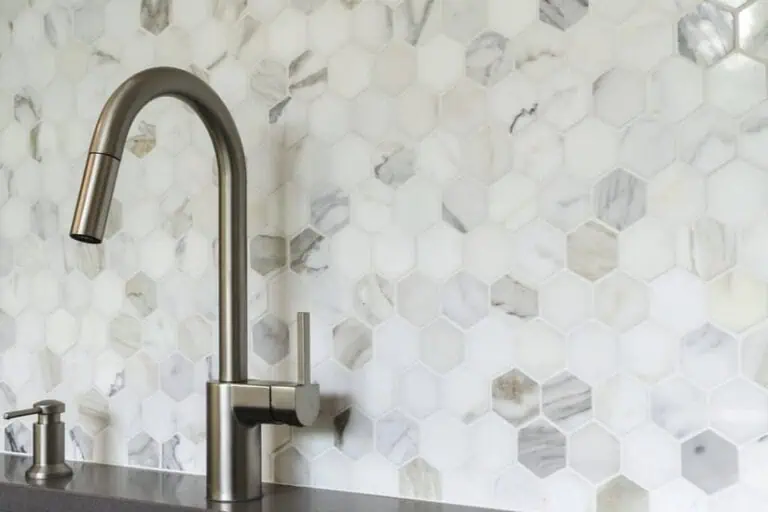 photo of a Sink with tile backsplash