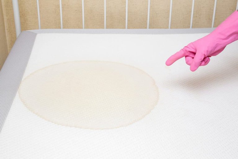 clean pack n play mattress with gloves