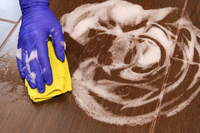clean tiles with soapy water