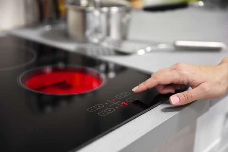 turning on electric stove