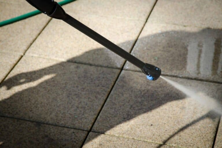 use pressure washer to clean the balcony floor