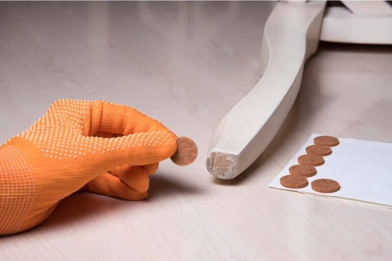 using furniture grippers to stop furniture from sliding