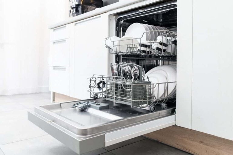 fully loaded white dishwasher
