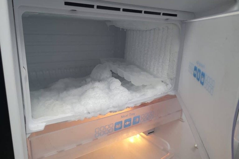 how to make fridge cool faster