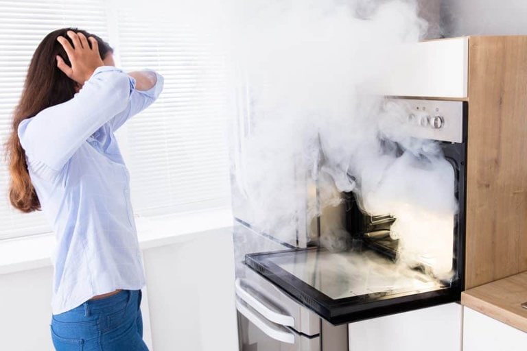 oven keeps smoking