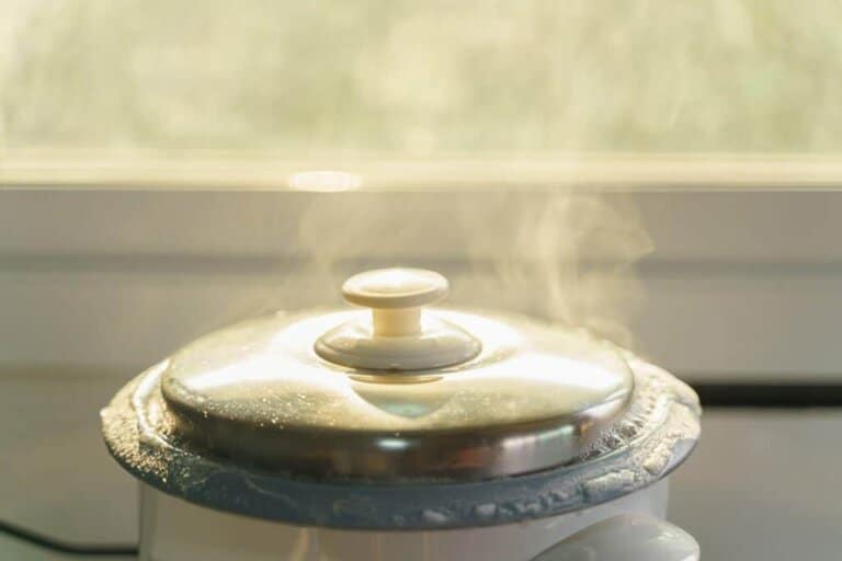 why is my rice cooker bubbling over