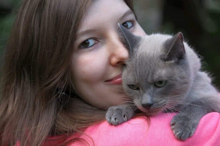 woman and blue cat