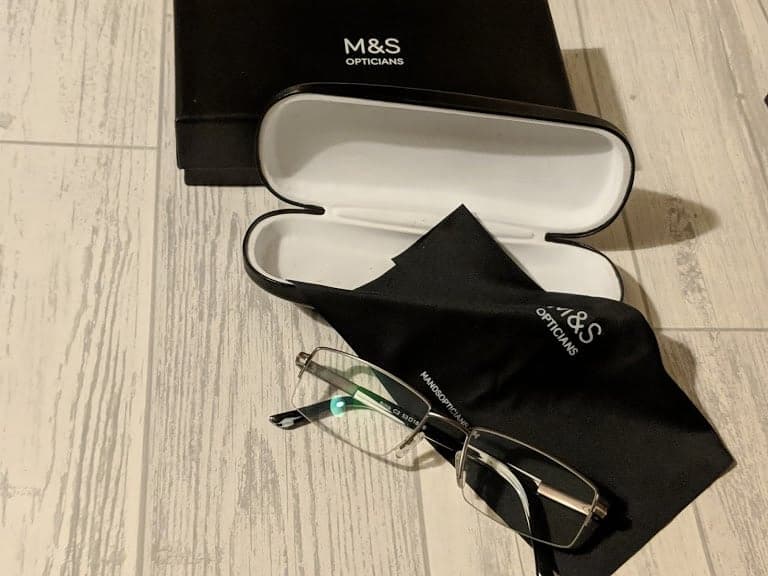 A pair of glasses in a case