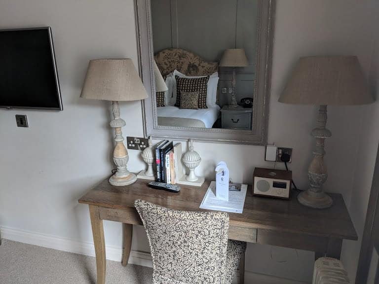 Furniture in bedroom in Coach and Horses in Kew