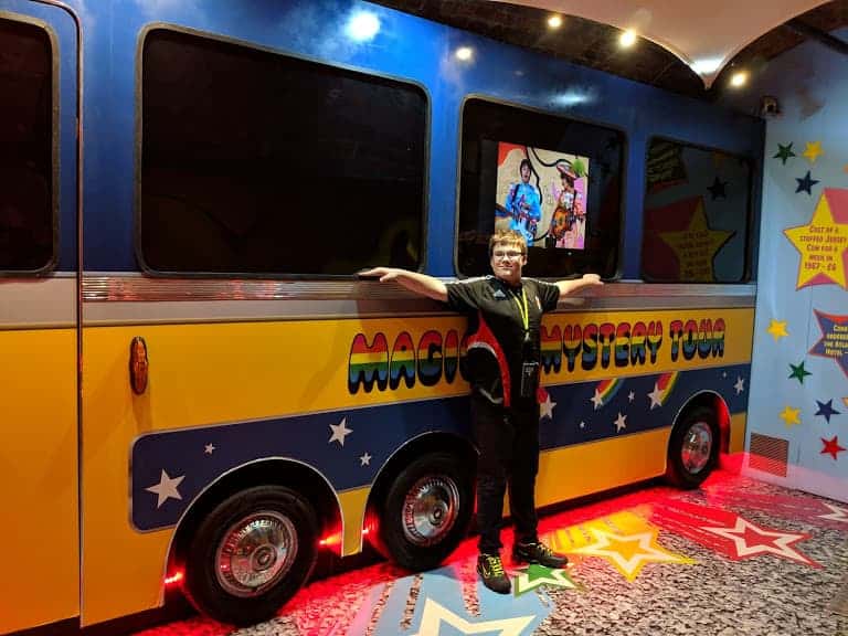 Ben in front of the Magical Mystery Tour bus
