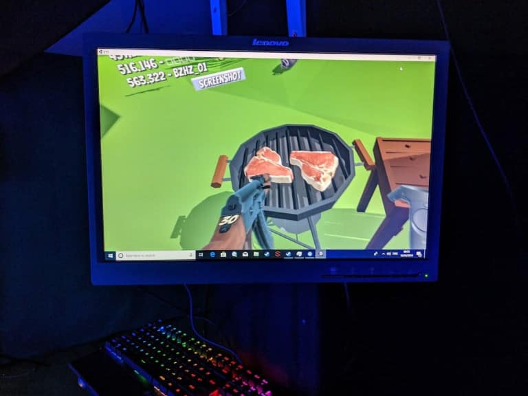 A TV screen showing a video of what Ben can see whilst he plays with the VR
