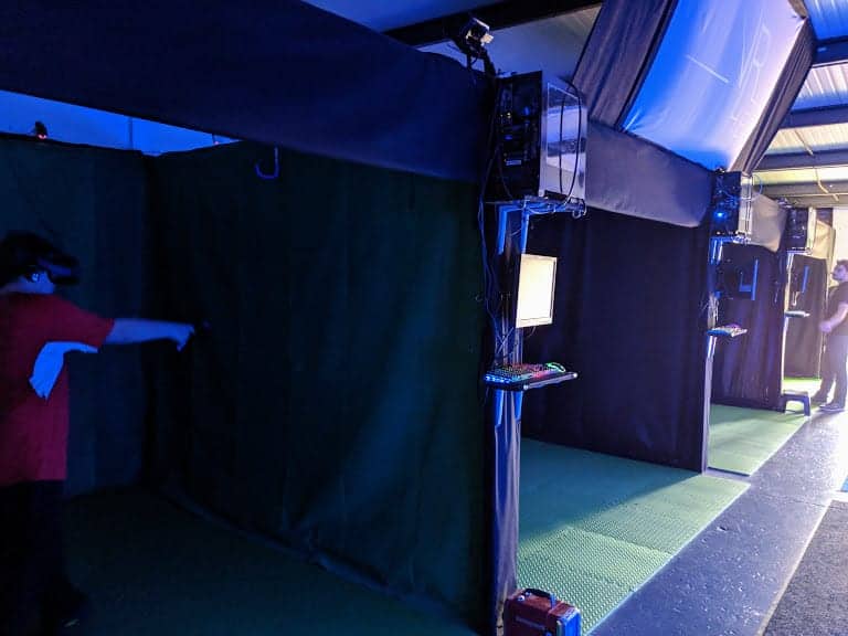 four booths for the people to play the VR games