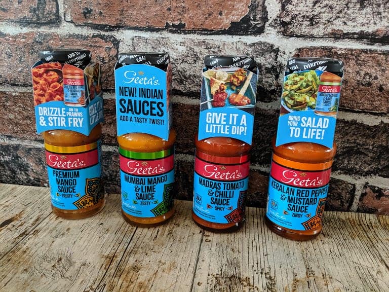 4 bottles of Geeta\'s sauces, premium mango chutney, mumbai mango and lime sauce, madras tomato and chilli sauce and Keralan red pepper and mustard sauce.