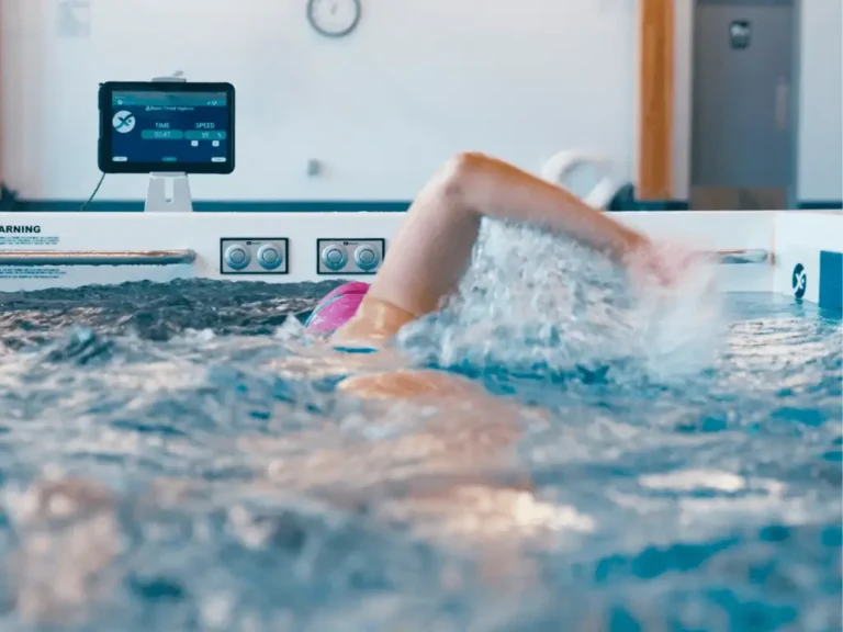Swimmer doing laps in a SwimEx pool