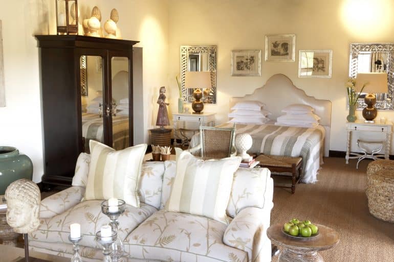 7. Bushmans Kloof Deluxe Room bed and seating area 770x513