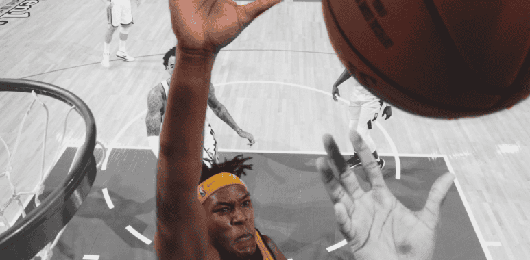 Myles Turner blocks a shot against the Kings