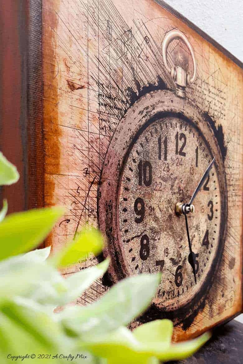 Make a unique statement with this DIY Da Vinci canvas clock. It’s quick and easy to make and the tutorial includes step-by-step instructions along with a free printable. #DIYClock #ACraftyMix #HomeDecor