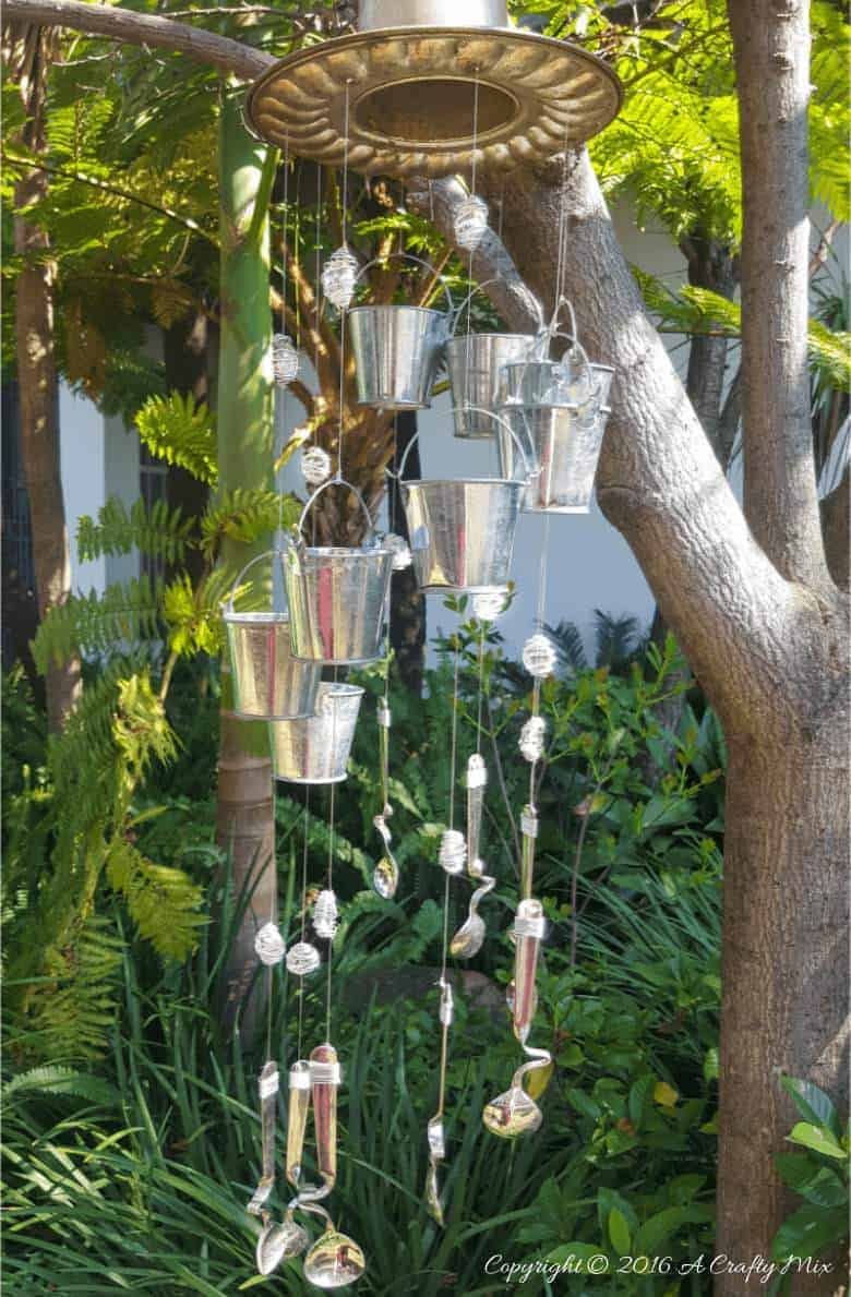 If you enjoy repurposing things, you'll love this easy tutorial that will show you how to turn a jelly mold into a one-of-a-kind wind chime. #windchimeDIY @acraftymix #repuposedwindchime
