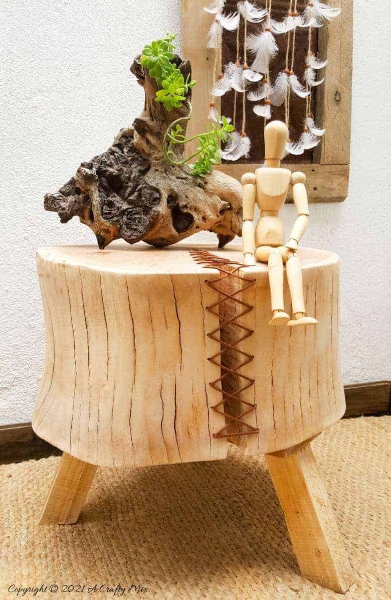 Do you have a gorgeous chunk of wood that’s developed a HUGE crack? Don't toss it out until you've seen how easy it is to turn a cracked wooden stump into a décor worthy feature. #HomeDecor #ACraftyMix #CrackedWood