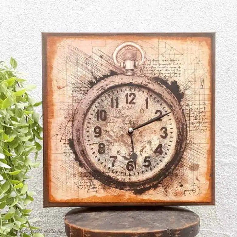 Make a unique statement with this DIY Da Vinci canvas clock. It’s quick and easy to make and the tutorial includes step-by-step instructions along with a free printable. #DIYClock #ACraftyMix #HomeDecor