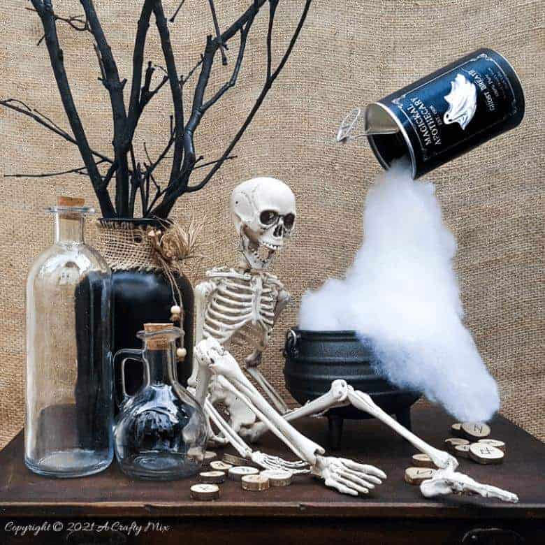 Add a little fun and mystery to your Halloween decor with this easy-to-make magical floating tin can filled with ghost breath. You don't need any special tools and it takes less than an hour to make too. #HalloweenDecor #HalloweenCrafts #ACraftyMix #FloatingTinCan