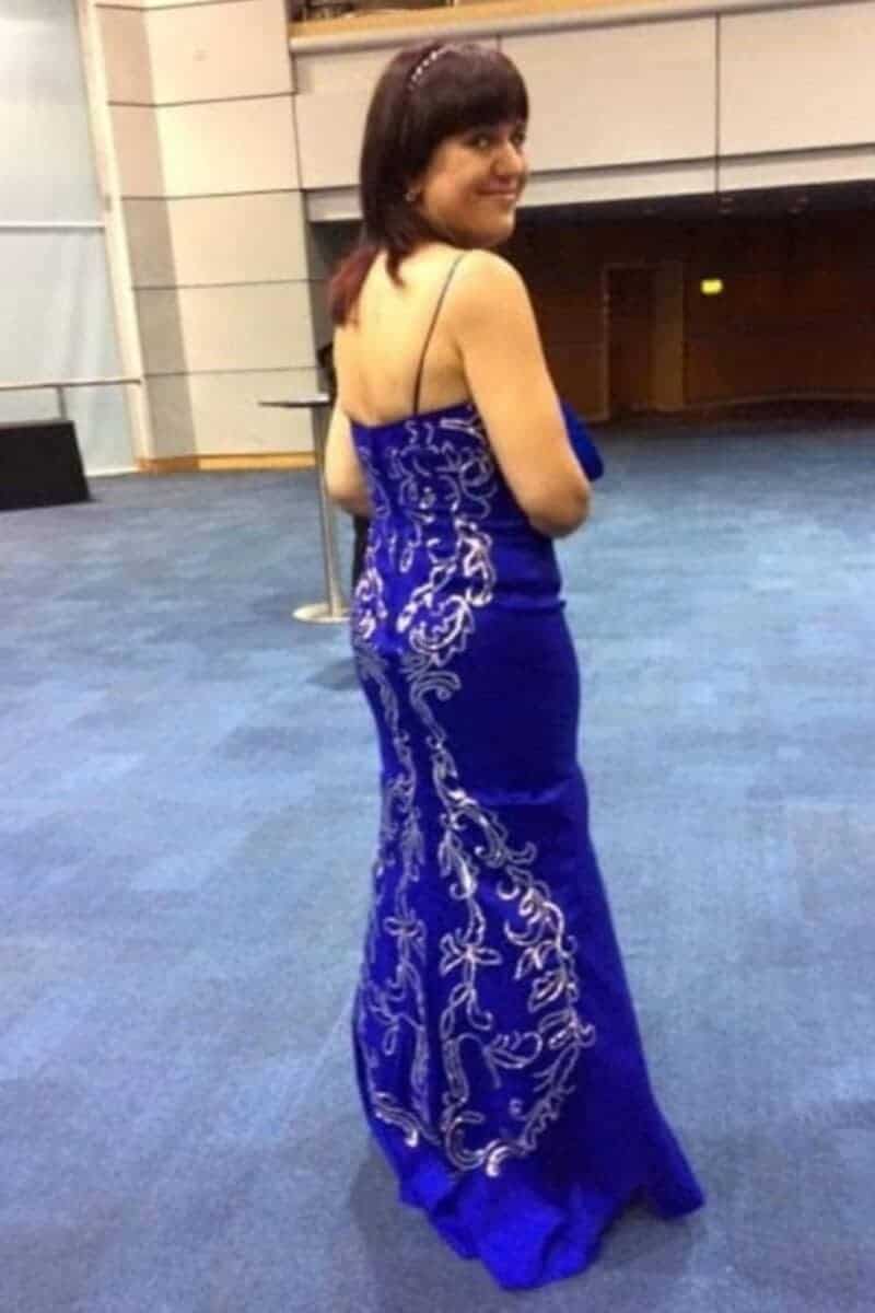slim lady in blue ballgown